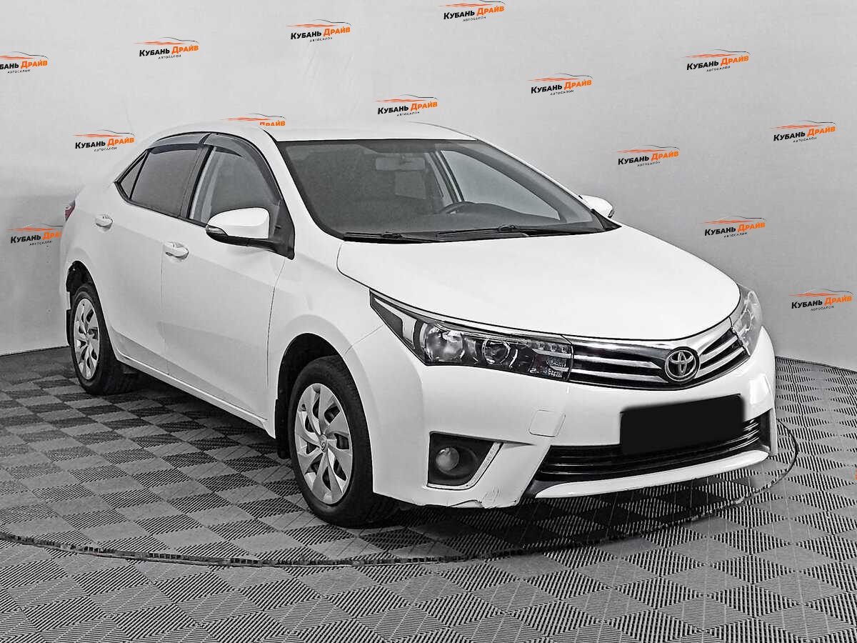 Toyota Corolla 2013 года с пробегом. Фото: #2