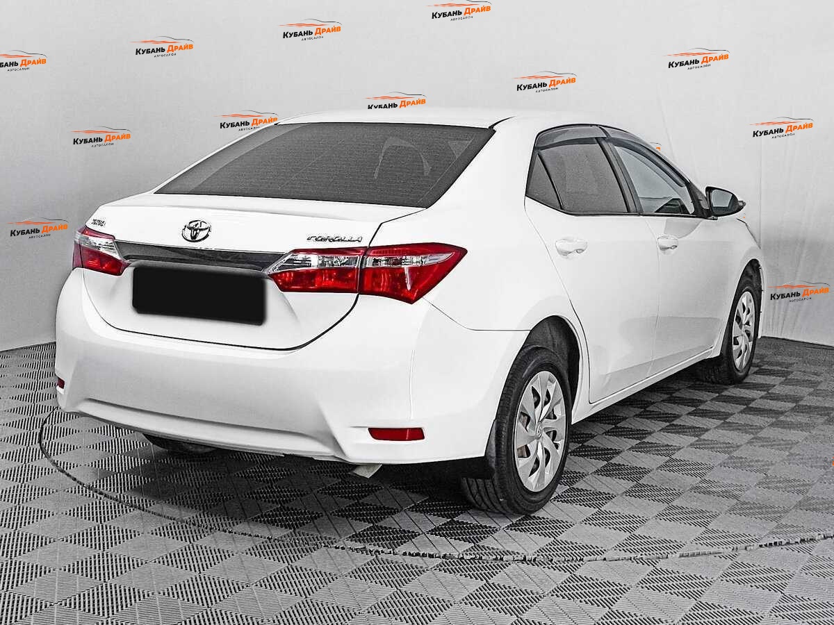 Toyota Corolla 2013 года с пробегом. Фото: #4