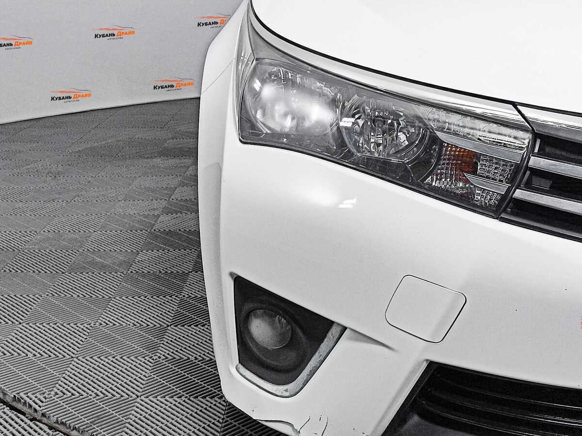 Toyota Corolla 2013 года с пробегом. Фото: #15