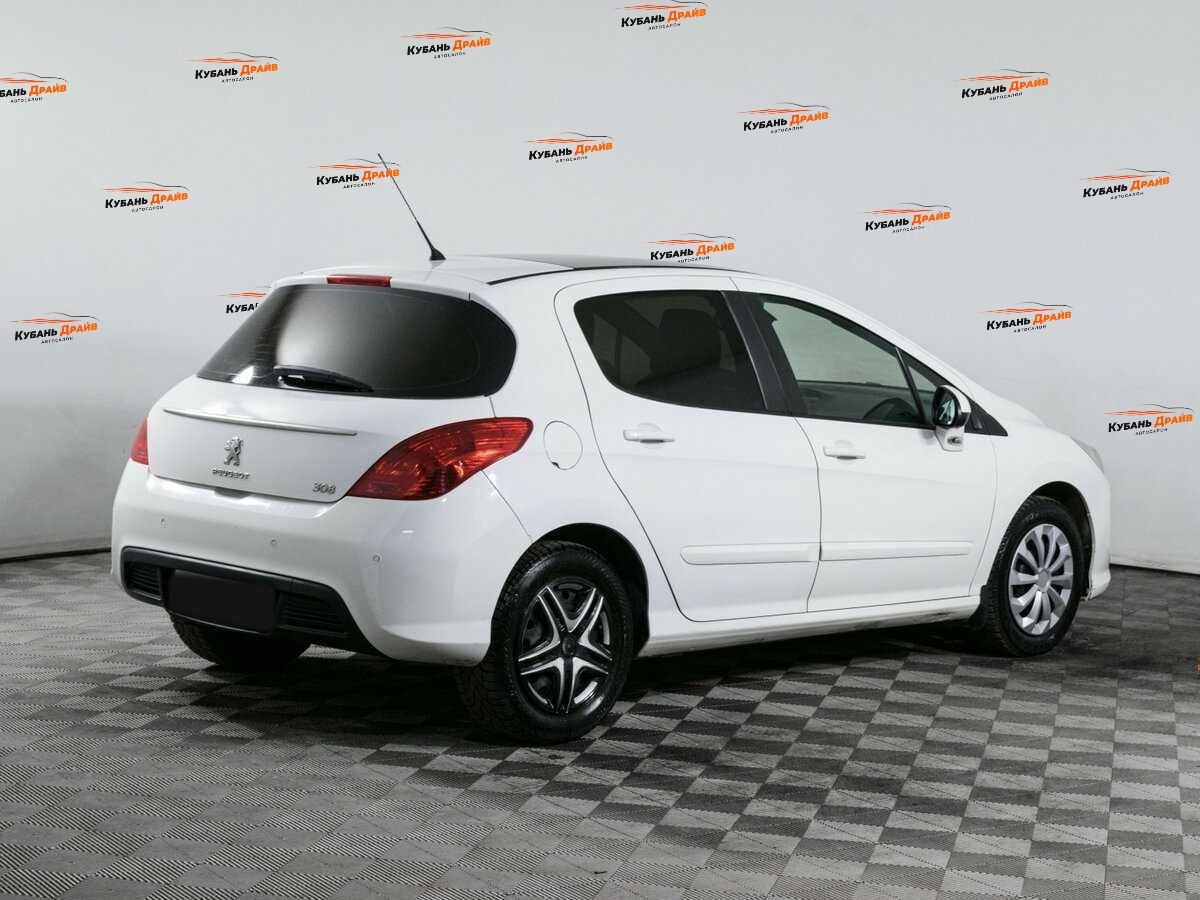 Peugeot 308 2012 года с пробегом. Фото: #3