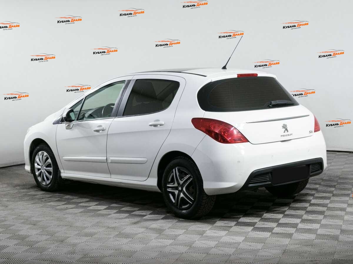 Peugeot 308 2012 года с пробегом. Фото: #5