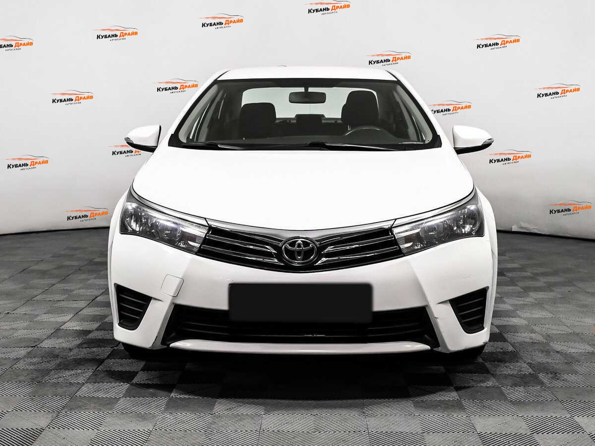 Toyota Corolla 2013 года с пробегом. Фото: #1