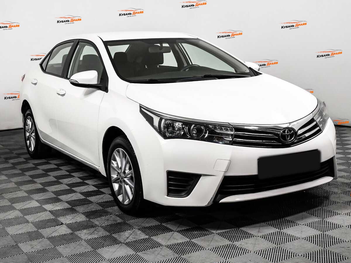 Toyota Corolla 2013 года с пробегом. Фото: #2