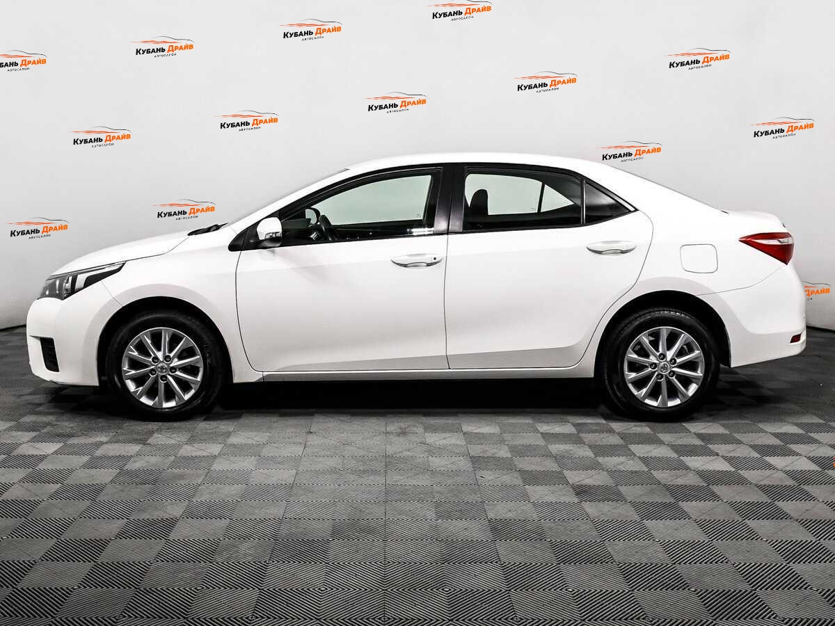 Toyota Corolla 2013 года с пробегом. Фото: #7