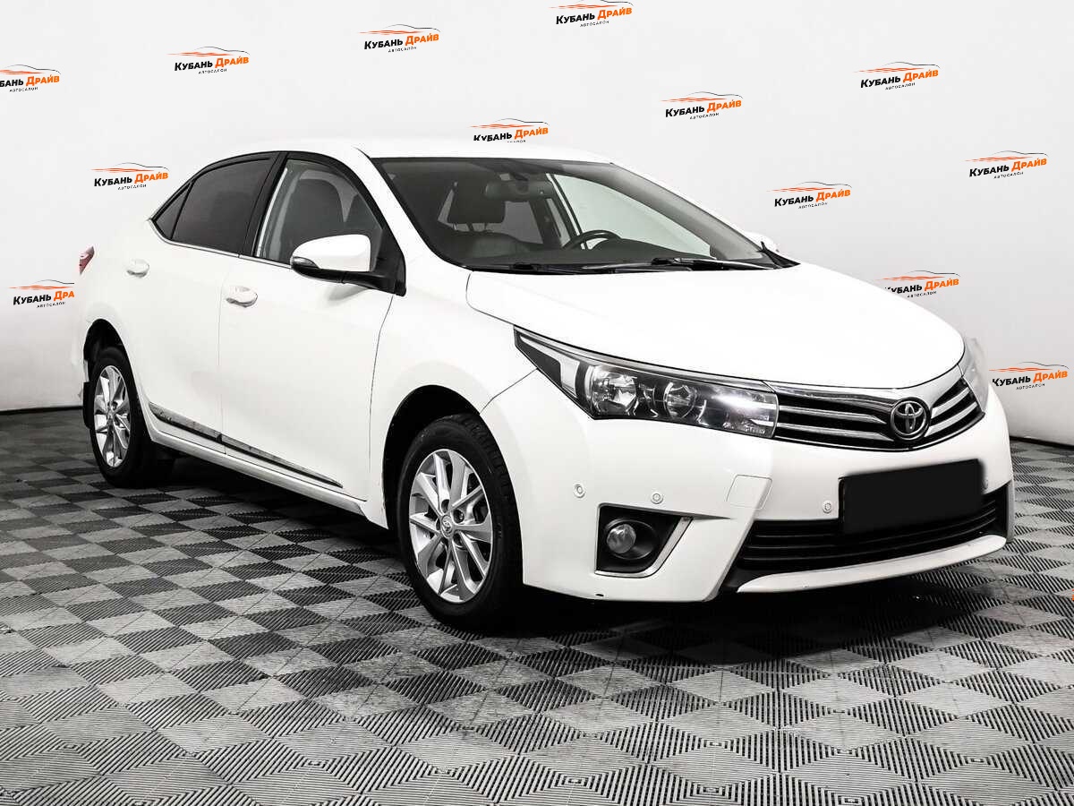 Toyota Corolla 2013 года с пробегом. Фото: #2