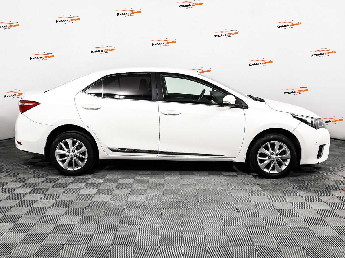 Toyota Corolla 2013 года с пробегом. Фото: #3