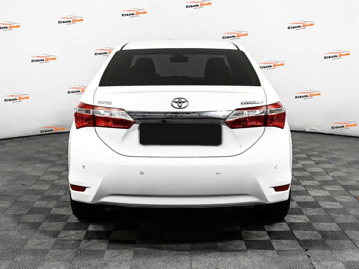 Toyota Corolla 2013 года с пробегом. Фото: #5