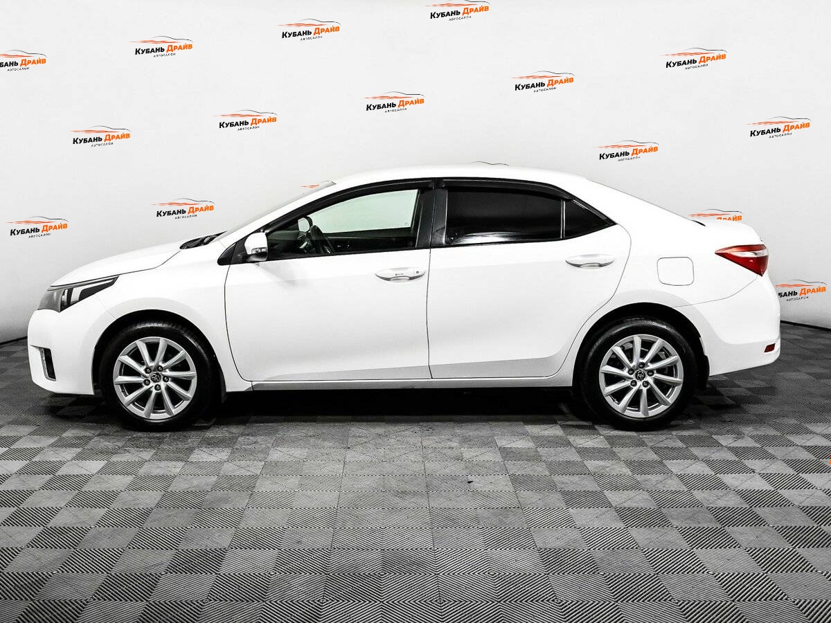 Toyota Corolla 2013 года с пробегом. Фото: #7
