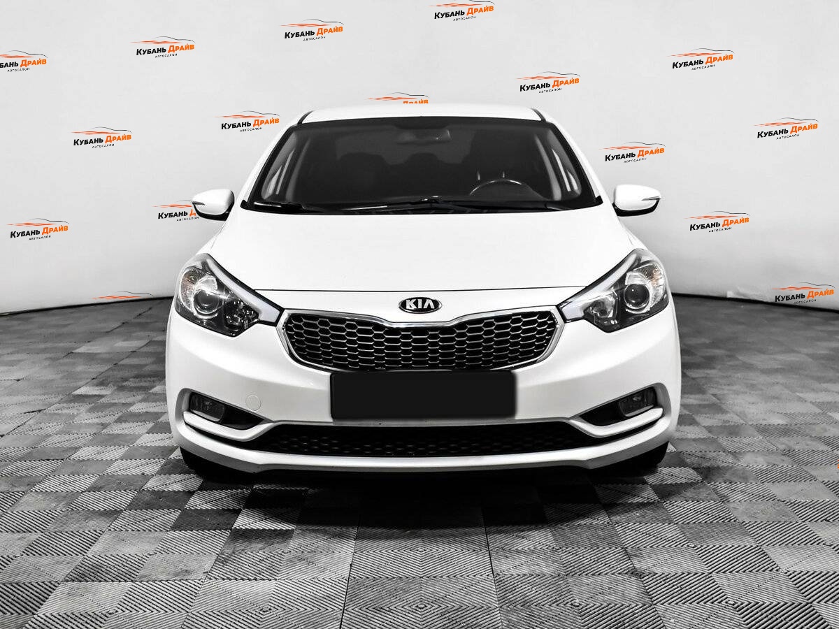 Kia Cerato 2013 года с пробегом. Фото: #1