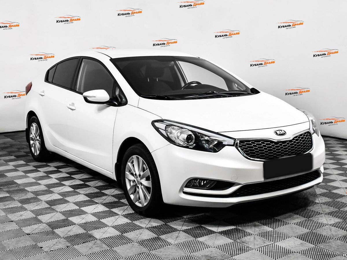 Kia Cerato 2013 года с пробегом. Фото: #2