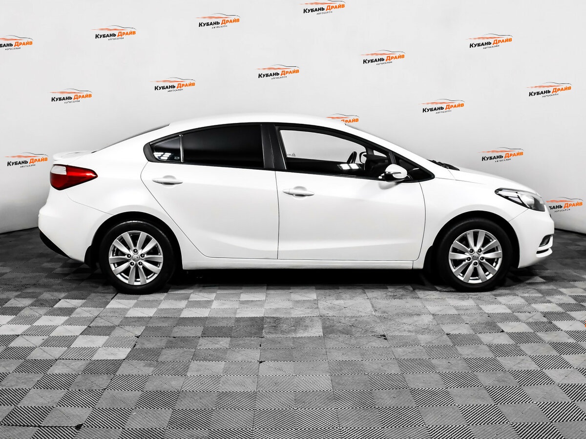 Kia Cerato 2013 года с пробегом. Фото: #3