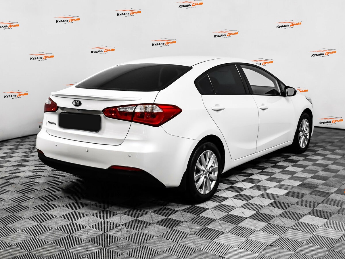Kia Cerato 2013 года с пробегом. Фото: #4