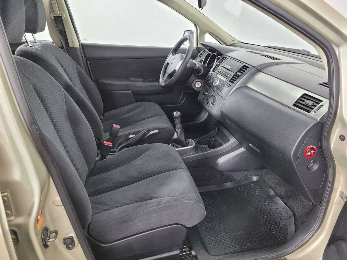 Nissan Tiida 2013 года с пробегом. Фото: #13