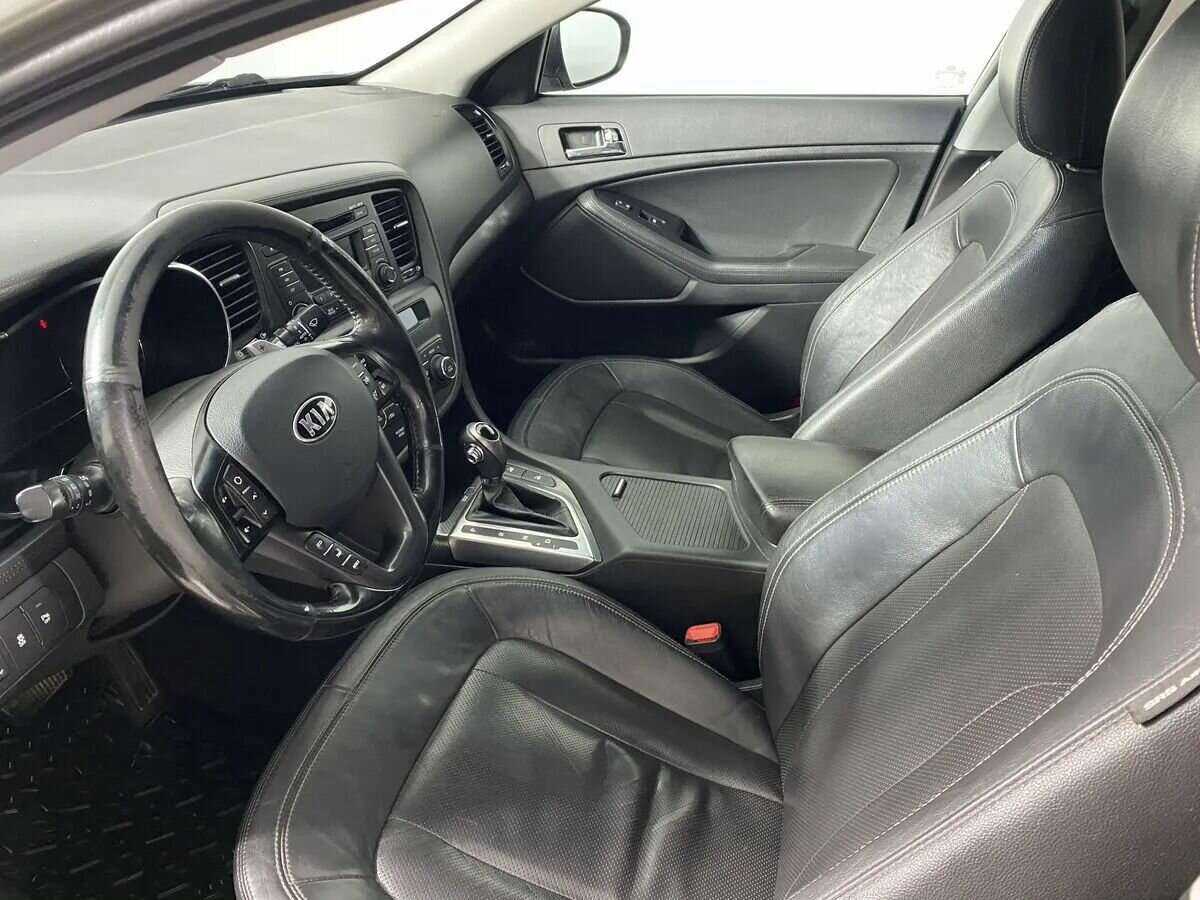 Kia Optima 2013 года с пробегом. Фото: #5