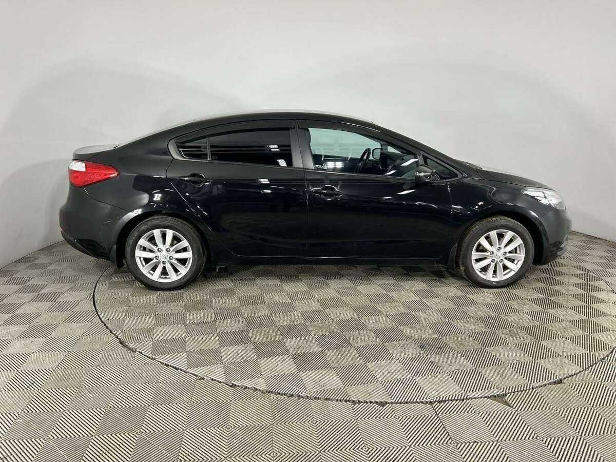 Kia Cerato 2014 года с пробегом. Фото: #3