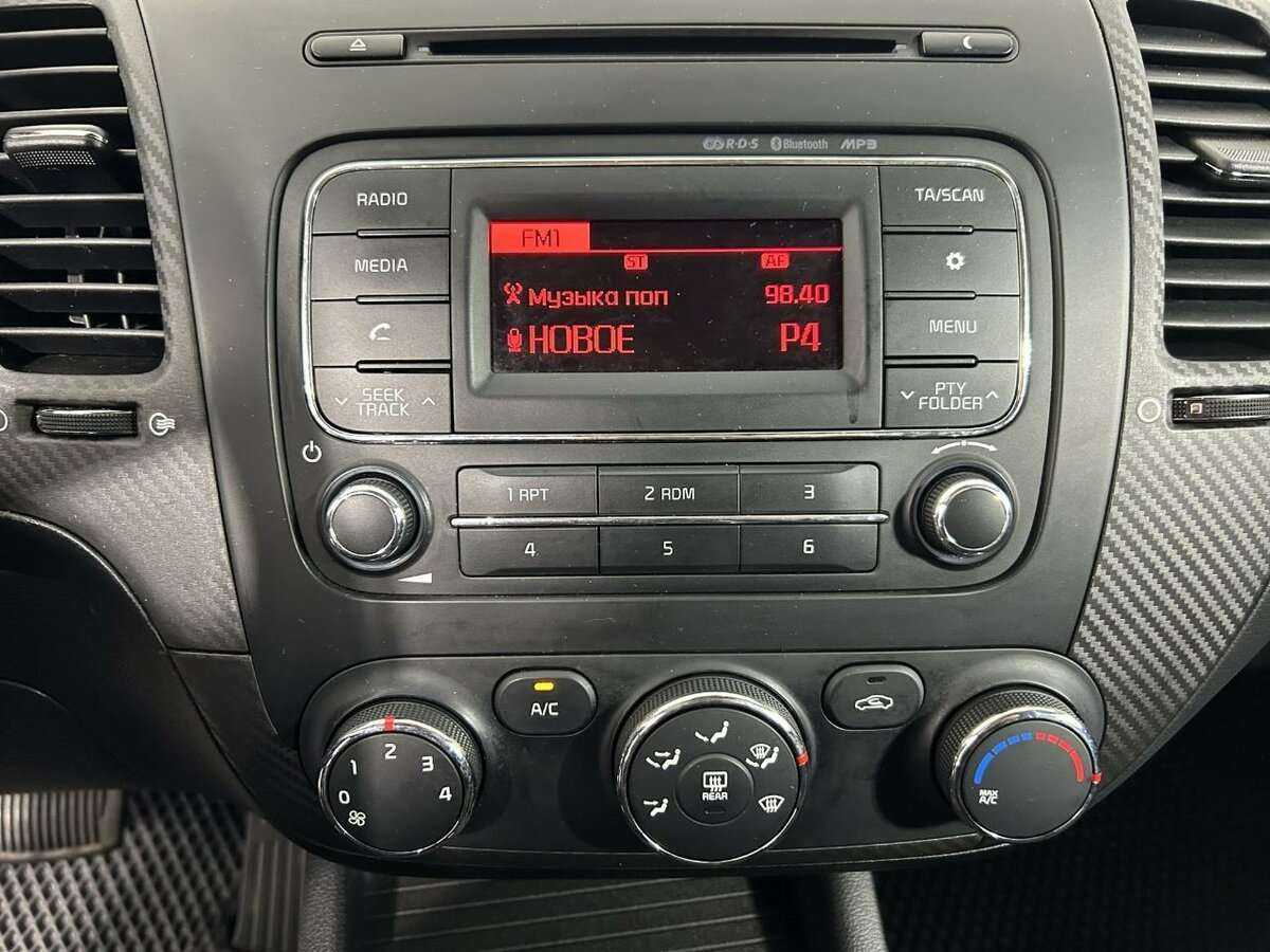 Kia Cerato 2014 года с пробегом. Фото: #11