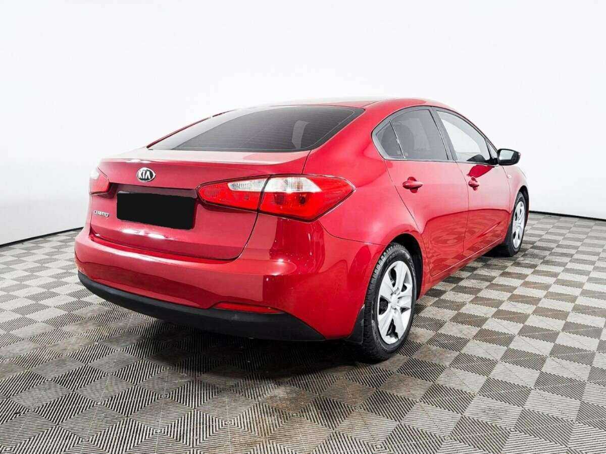 Kia Cerato 2013 года с пробегом. Фото: #3