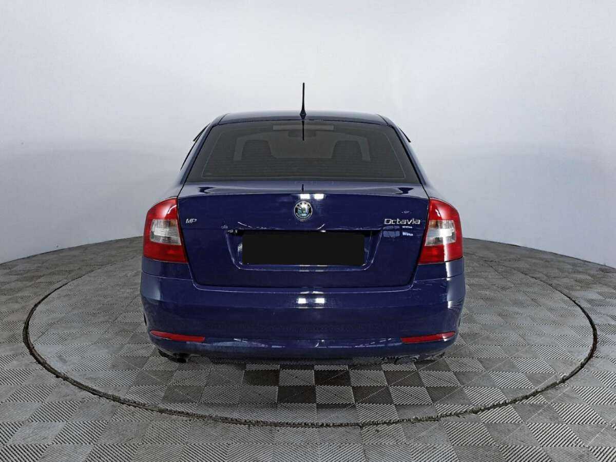 Skoda Octavia 2012 года с пробегом. Фото: #4