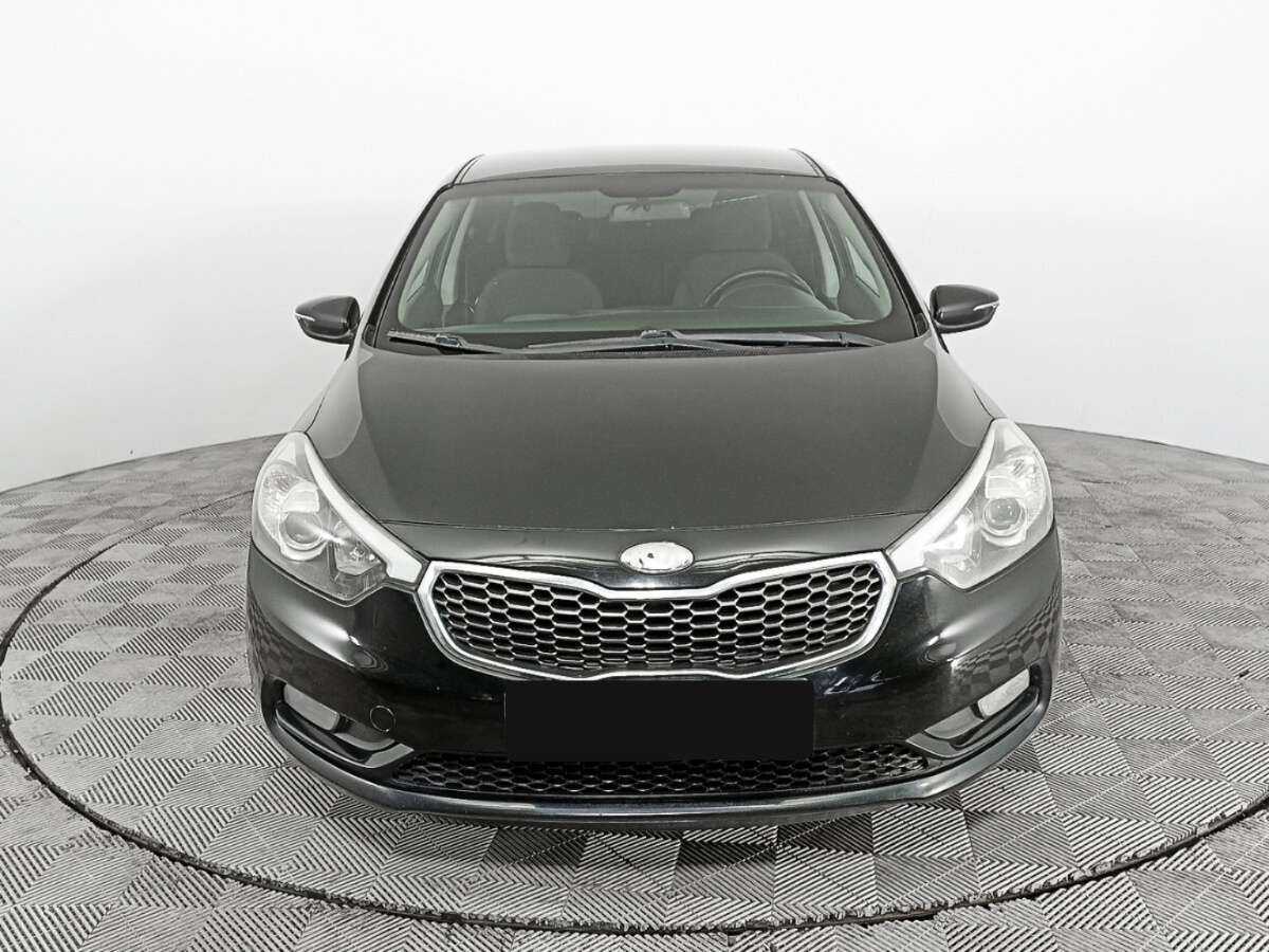 Kia Cerato 2013 года с пробегом. Фото: #1