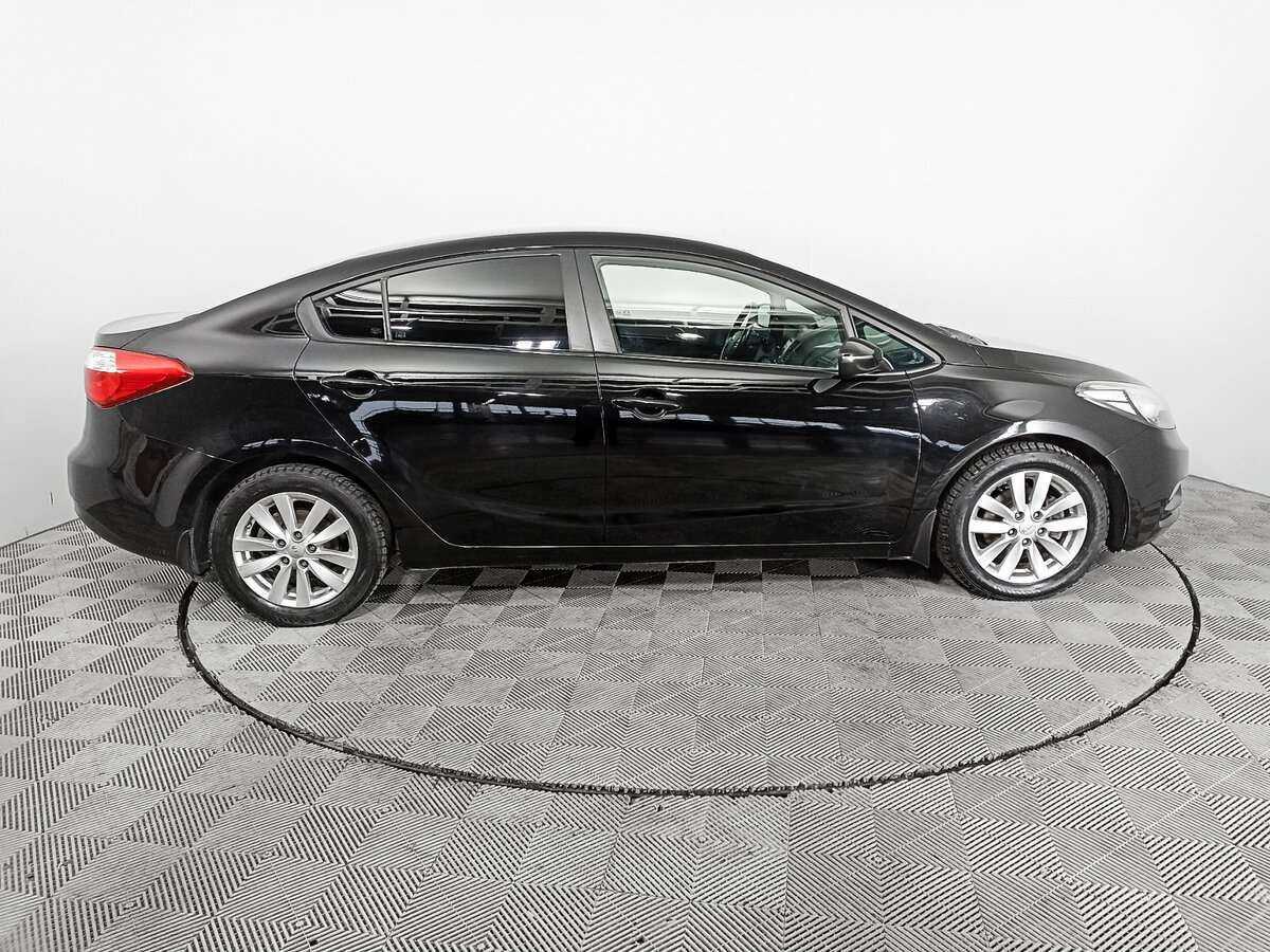 Kia Cerato 2013 года с пробегом. Фото: #3