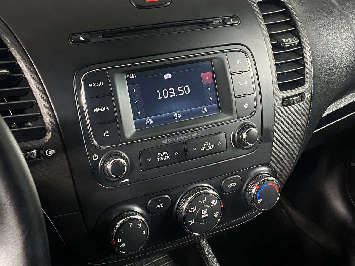 Kia Cerato 2013 года с пробегом. Фото: #10