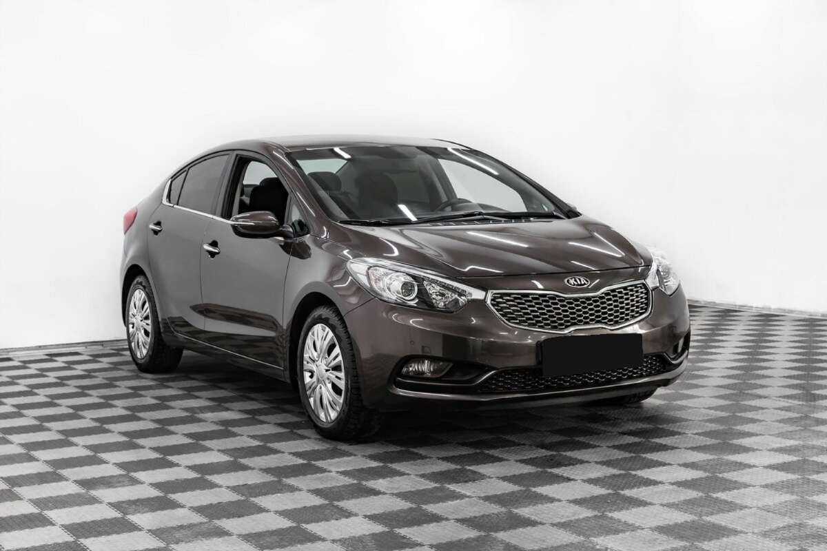 Kia Cerato 2013 года с пробегом. Фото: #2