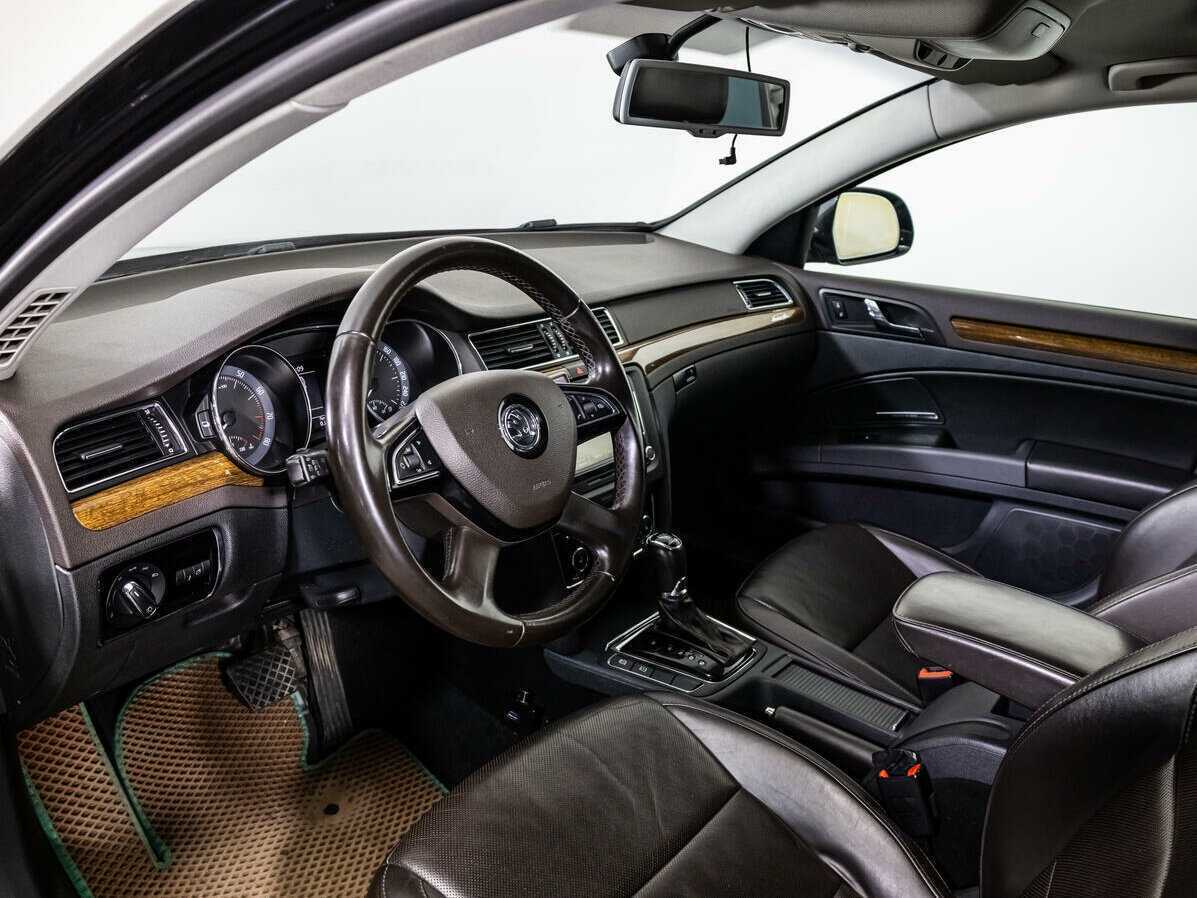 Skoda Superb 2014 года с пробегом. Фото: #10