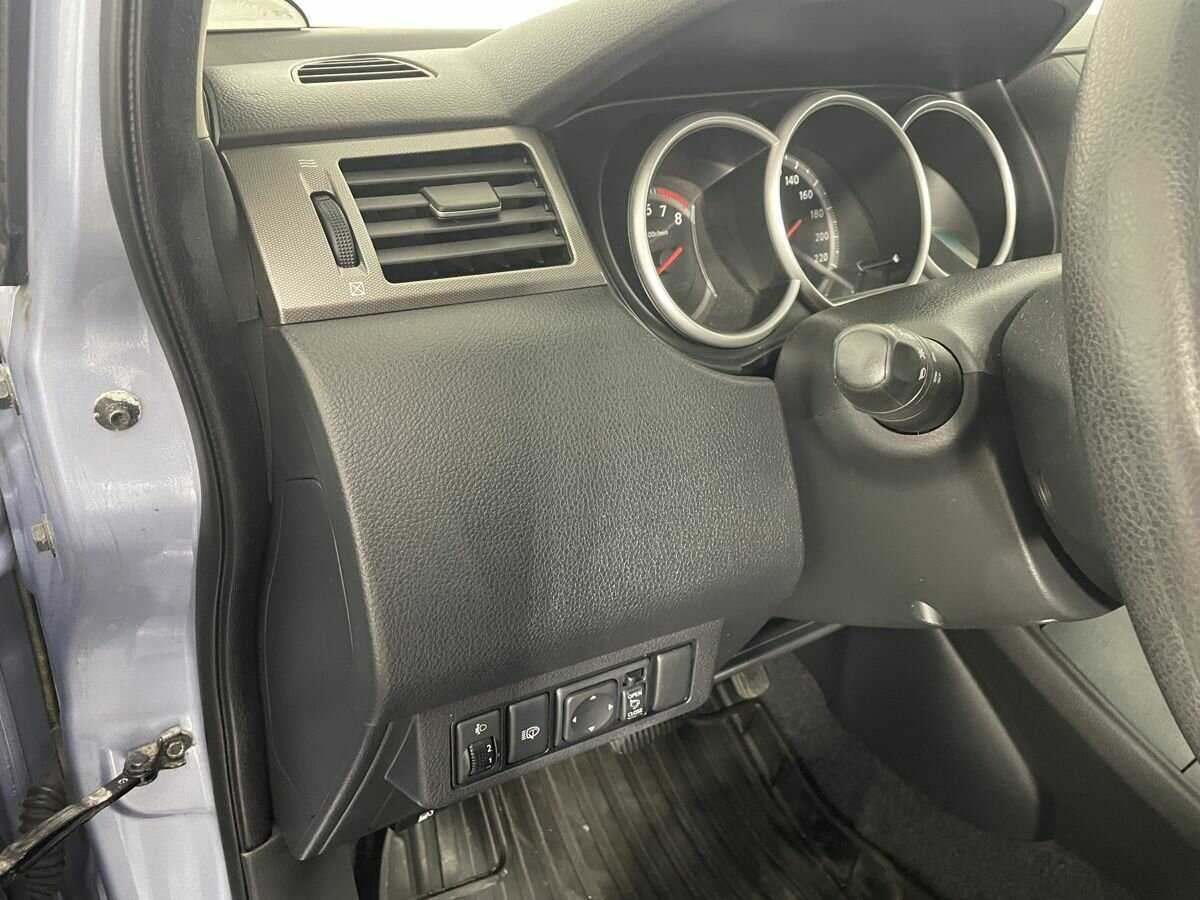 Nissan Tiida 2013 года с пробегом. Фото: #8