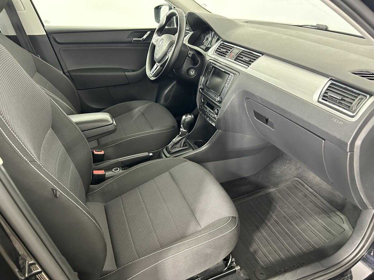 Skoda Rapid 2014 года с пробегом. Фото: #13