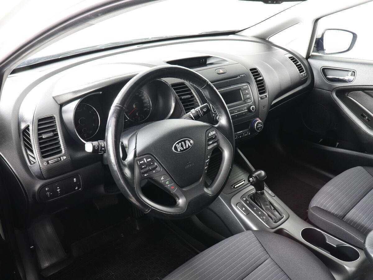 Kia Cerato 2013 года с пробегом. Фото: #8