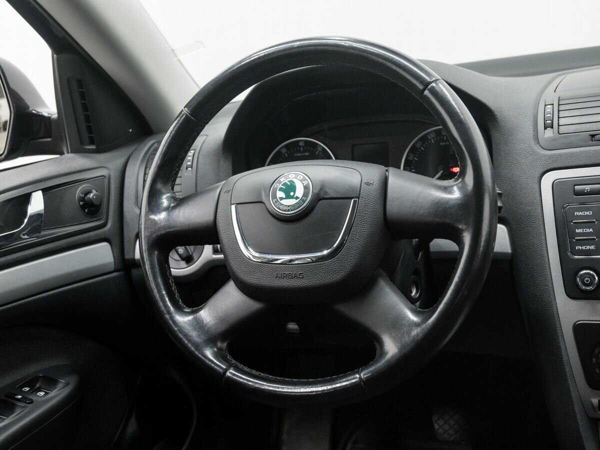 Skoda Octavia 2012 года с пробегом. Фото: #9