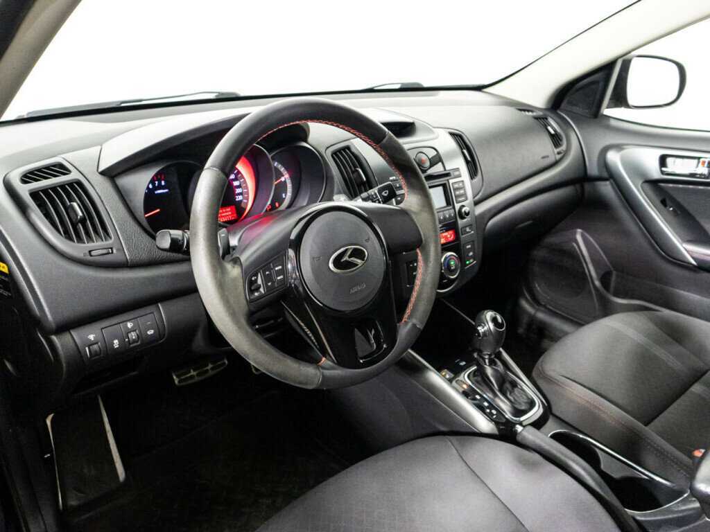 Kia Cerato 2012 года с пробегом. Фото: #10