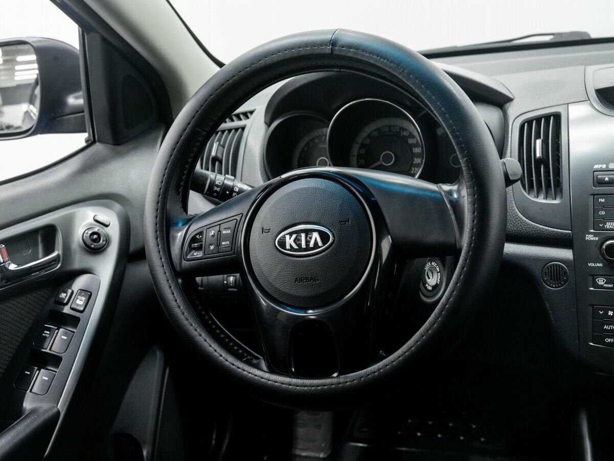 Kia Cerato 2012 года с пробегом. Фото: #10