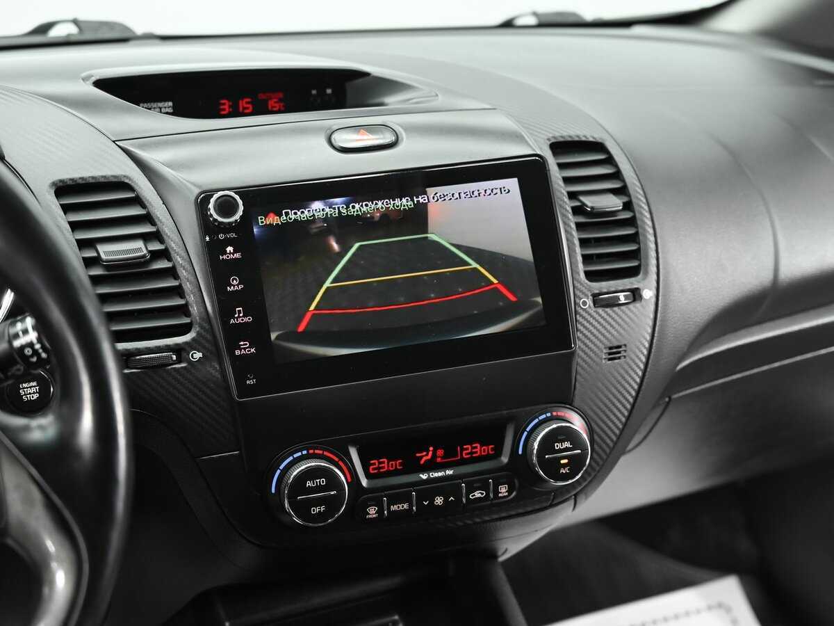 Kia Cerato 2013 года с пробегом. Фото: #11