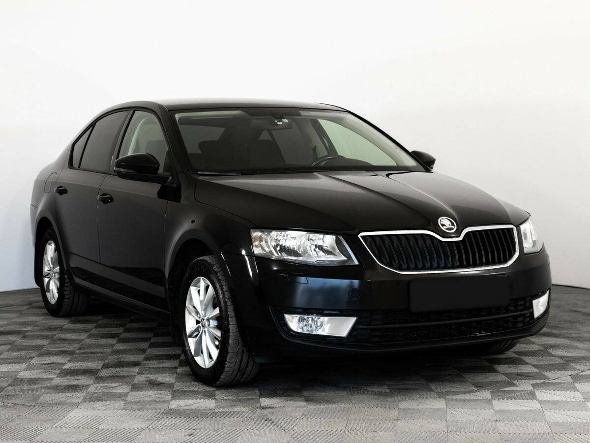 Skoda Octavia 2013 года с пробегом. Фото: #2