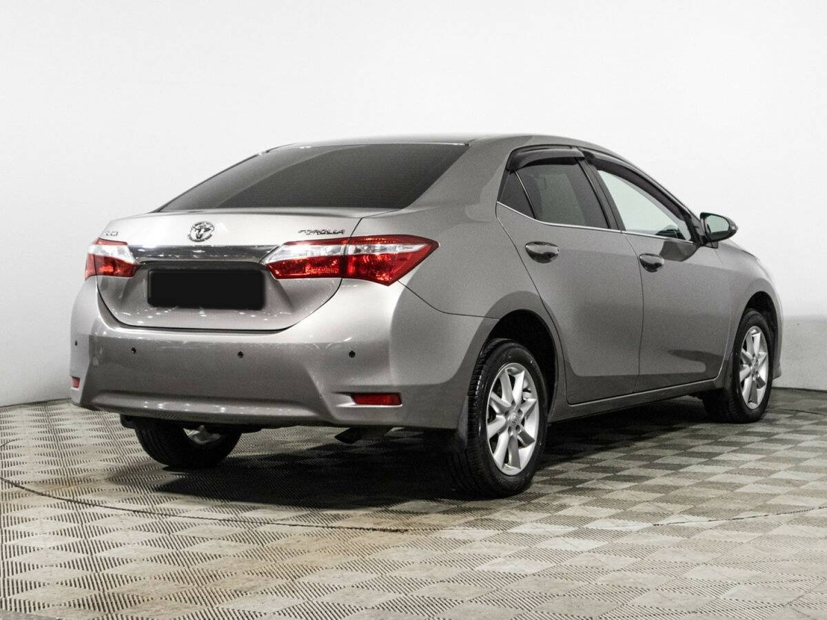 Toyota Corolla 2013 года с пробегом. Фото: #4