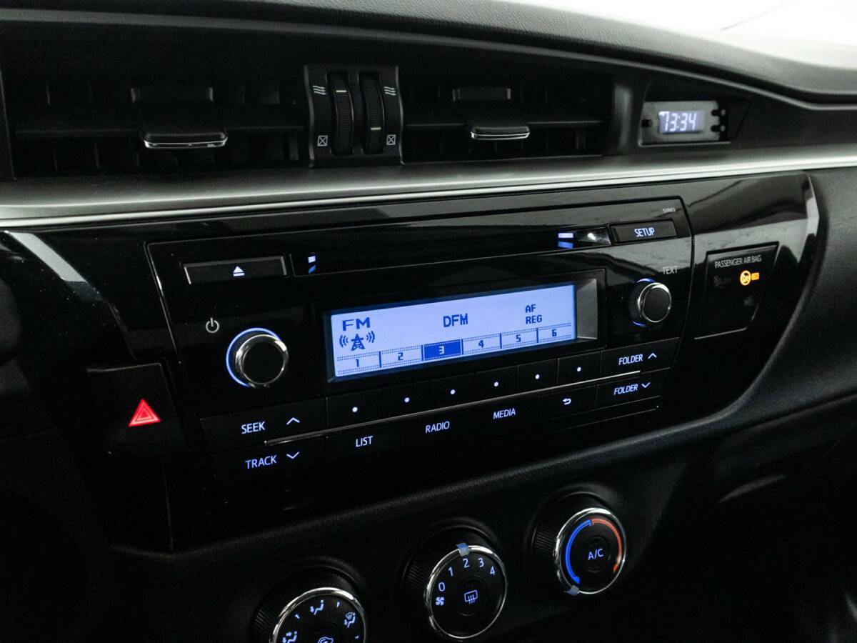 Toyota Corolla 2013 года с пробегом. Фото: #15