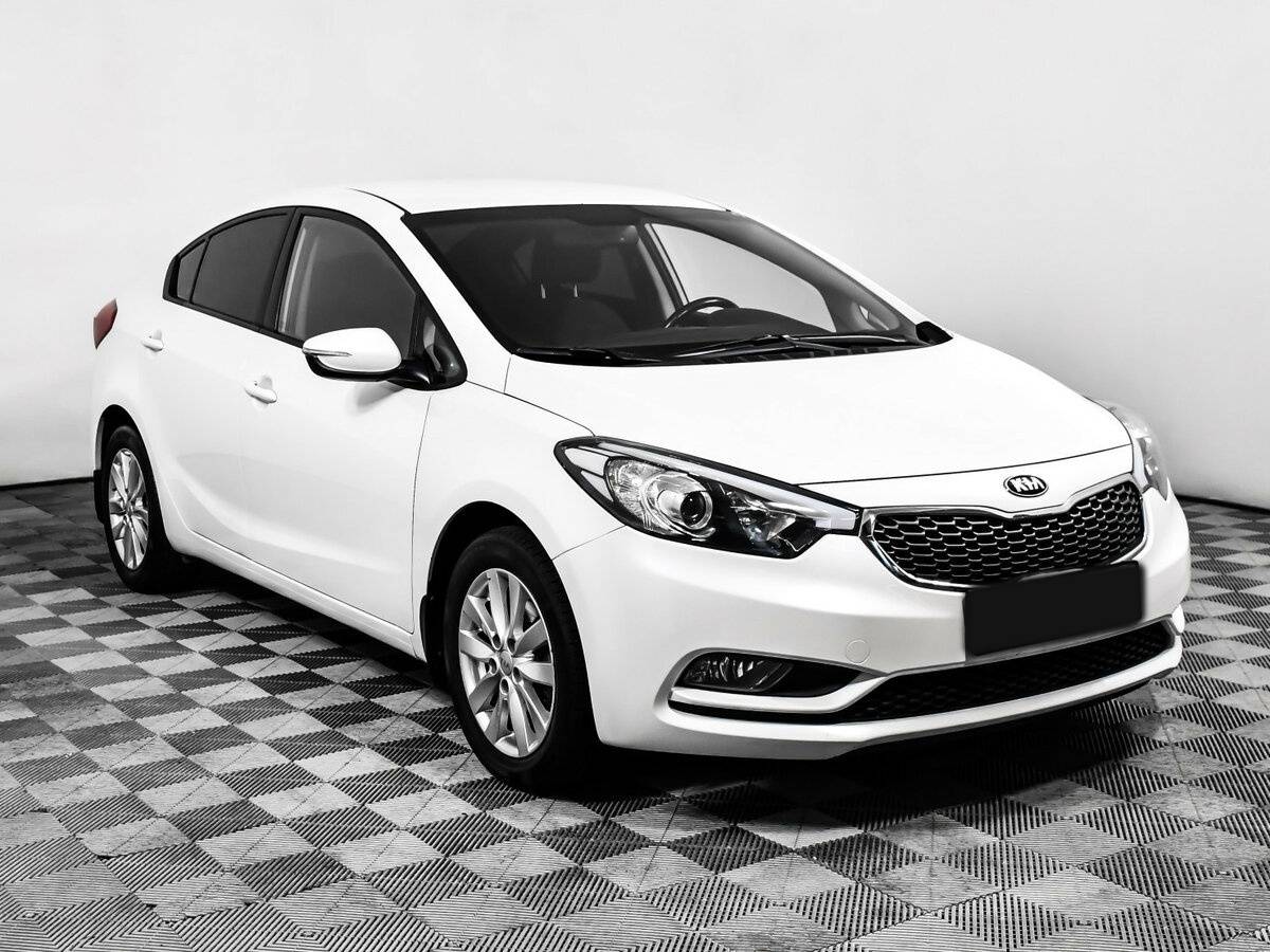 Kia Cerato 2013 года с пробегом. Фото: #2