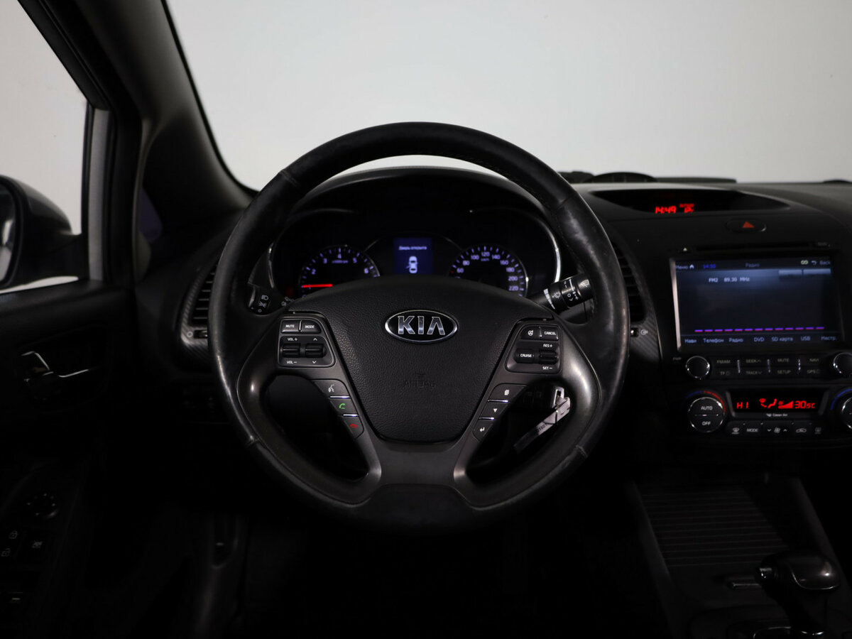 Kia Cerato 2013 года с пробегом. Фото: #9
