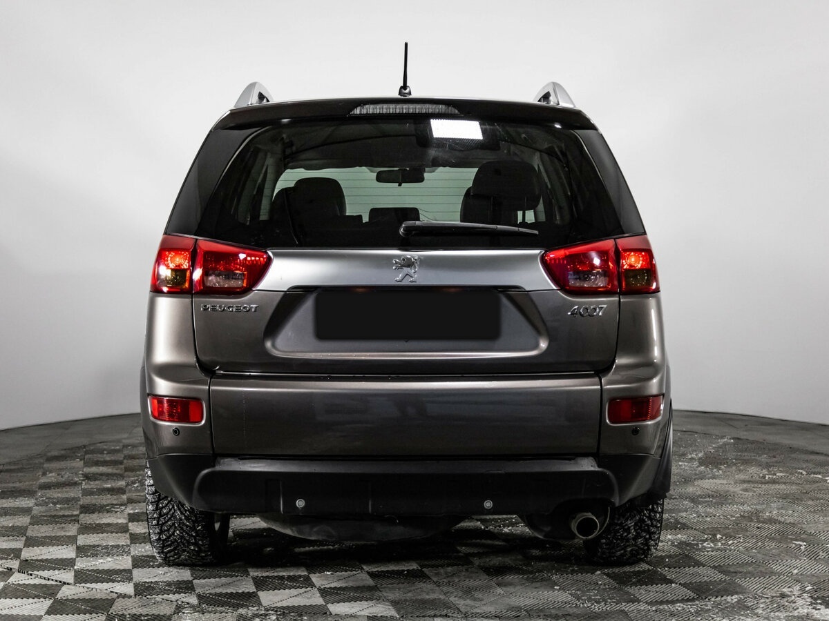 Peugeot 4007 2012 года с пробегом. Фото: #4